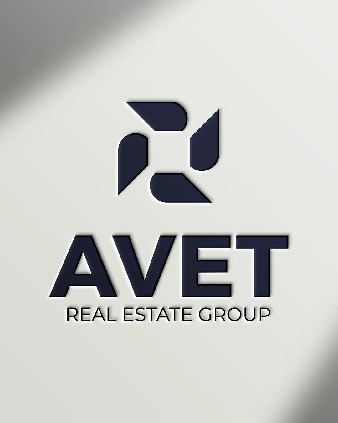 Avet logo on a light wall